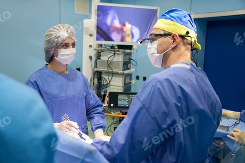 Preview: Surgeons Performing Operation in Hospital Operating Room