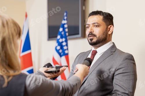 Preview: Mature confident deputy or delegate answering questions of journalists