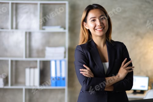 Preview: Portrait of a charming business woman in the office.