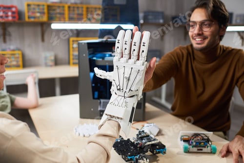 Preview: Student trying to control robotic arm