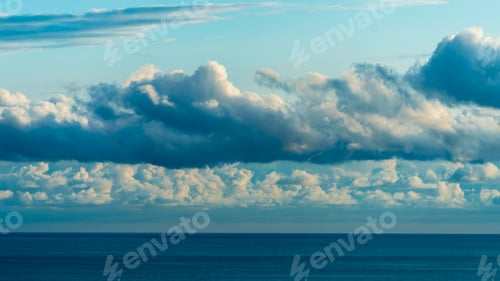 Preview: Panoramic view of bright blue sea, blue sky with fluffy white clouds