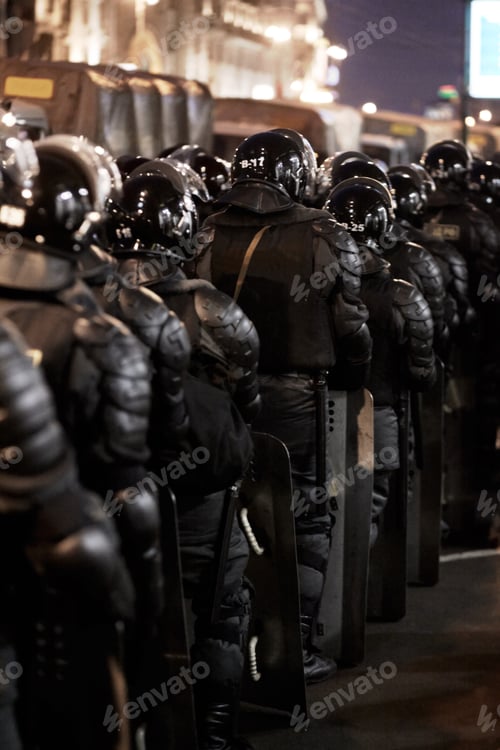 Preview: Soldiers stick together. The army barricading a riot in the city.