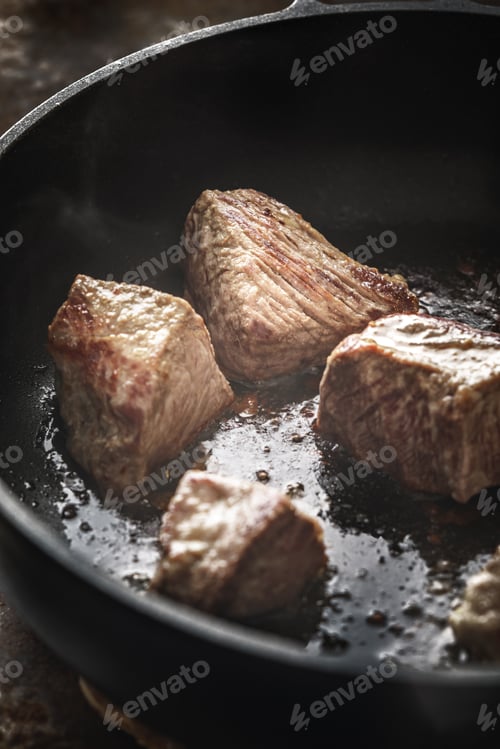 Preview: Fried angus beef in the hot pan vertical