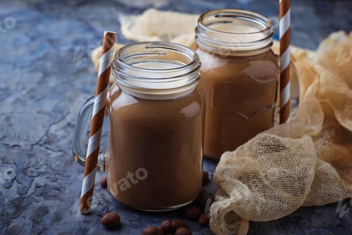 Preview: Coffee with milk in jar