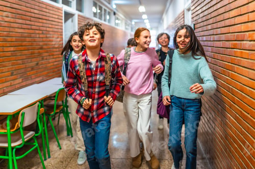 Preview: Group of students running in school hallway