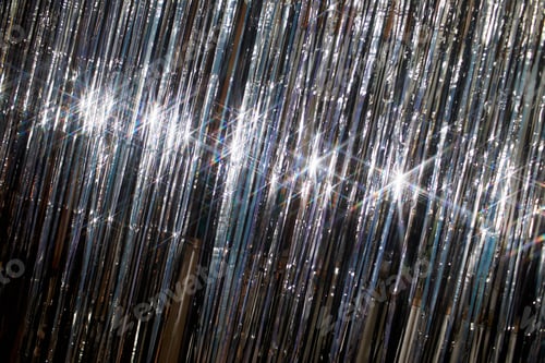 Preview: Silver Tinsel Shining Bright while Decorating Room for Christmas Celebration