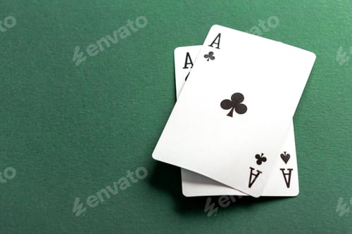 Preview: Cards and chips for poker on green table
