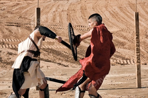 Preview: A Concept Photo Of A Roman Battle Of Two Warriors Of The Colosseum In Action With Aggressive