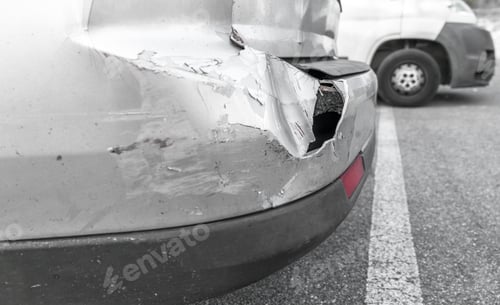 Preview: Back of gray car get damaged from accident on the road