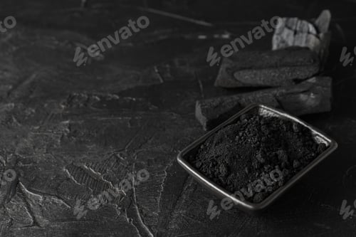 Preview: Natural hardwood charcoal on black textured background