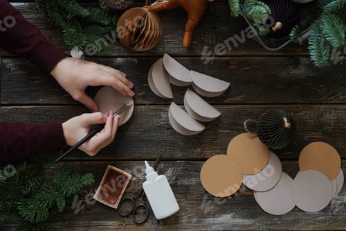 Preview: Top view of fir branches with diy honeycomb balls. Process making honeycomb paper decorations