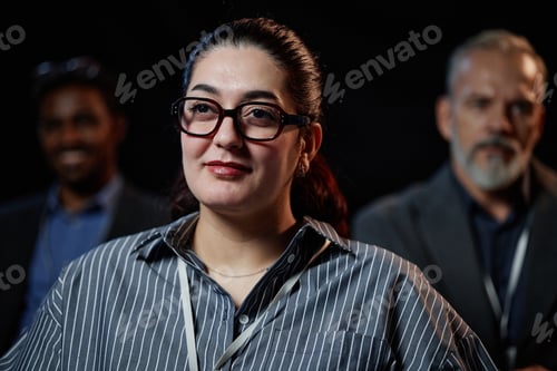 Preview: Portrait Female Finance Professional Attending Business Event in Auditorium