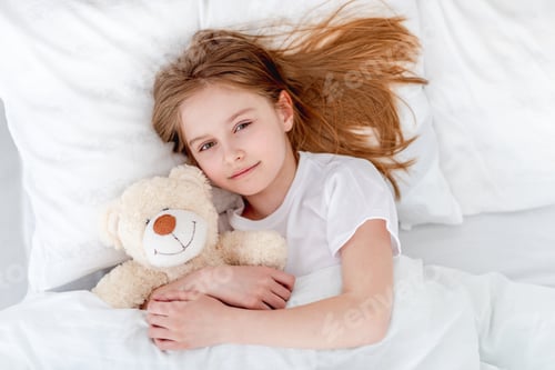 Preview: Girl in the bed with teddy bear