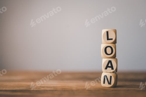Preview: wooden block with the word "LOAN". concept of real estate loan agreement, real estate loan