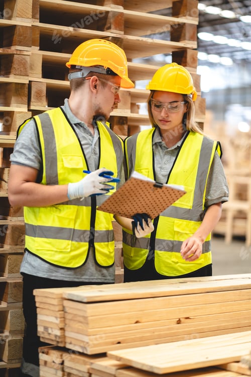 Preview: Engineer team in warehouse examining hardwood material for wood furniture production, check stock