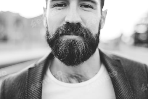 Preview: Young bearded man outdoor