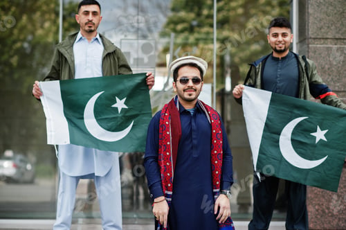 Preview: Group of pakistani man wearing traditional clothes salwar kameez or kurta with Pakistan flags.