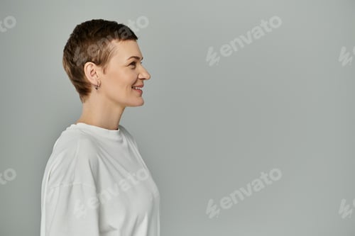 Preview: Woman smiling, breast cancer awareness