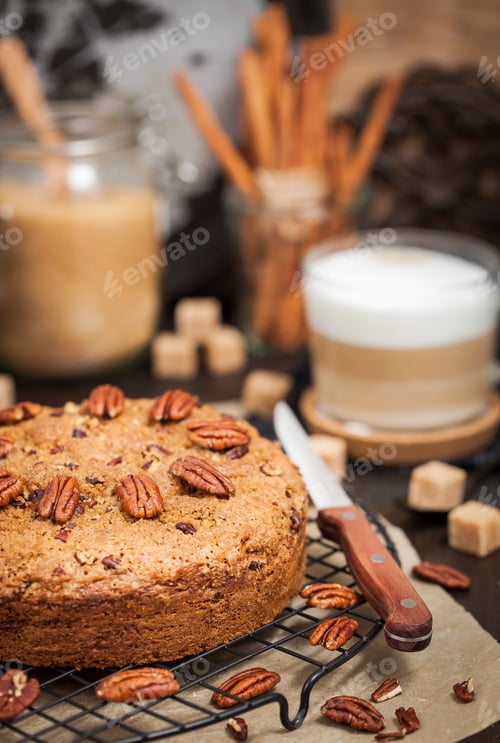 Preview: Pecan Cake with Coffee on a Wooden Table