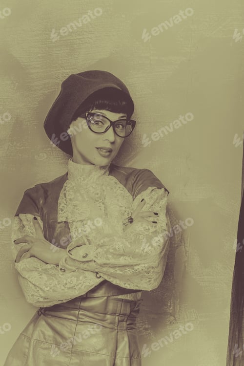 Preview: Portrait Of A Romantic Frenchwoman Beret, Vintage Dress And Wearing Glasses. The Concept Of Retro