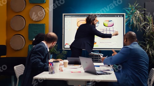 Preview: Financial analyst briefing his team about new company objectives