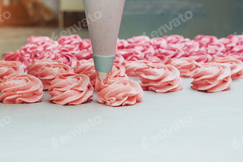 Preview: Homemade marshmallows pink on a white parchment