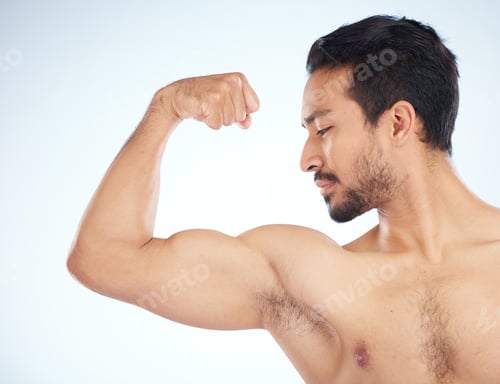 Preview: Asian man, body of bicep flex on studio background in studio for muscle growth progress, healthcare