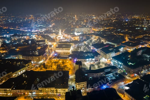Preview: Aerial view of bright illuminated streets and buildings in Ukrainian Ivano-Frankivsk city center at