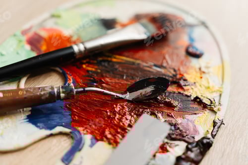 Preview: Artist's Palette with Vibrant Colors and Painting Tools