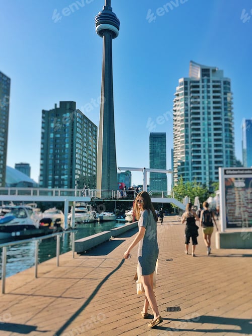 Preview: Young girl walking in the city of Toronto