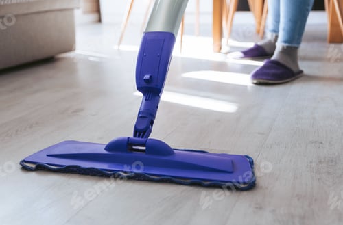 Preview: Close-up cropped image of floor mop, person cleaning floor, spring cleaning.