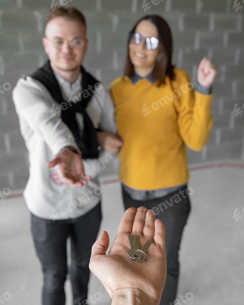 Preview: woman and man happy couple made the purchase of their own home