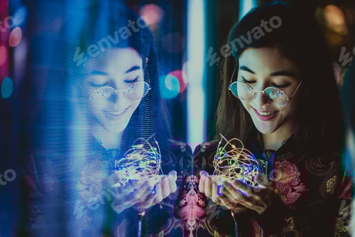 Preview: Pretty asian woman portrait with led lights