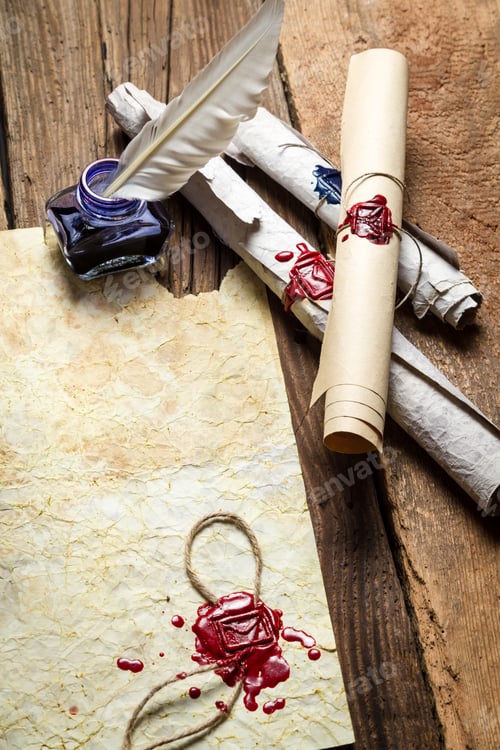 Preview: Inkwell and ancient scrolls on wooden table