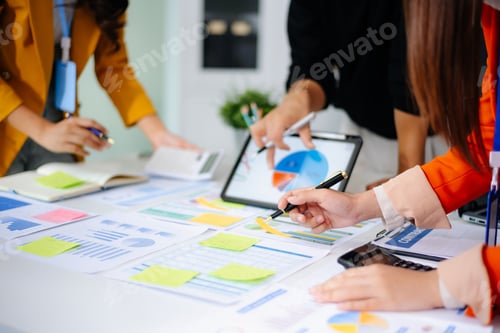 Preview: Business documents on office table with smart phone and calculator digital tablet and graph business