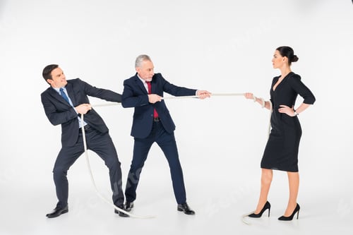 Preview: Three concentrated businesspeople pulling rope isolated on white