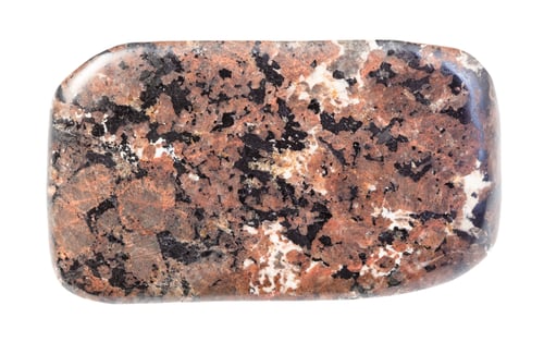 Preview: polished spreusteined Urtite rock isolated on white