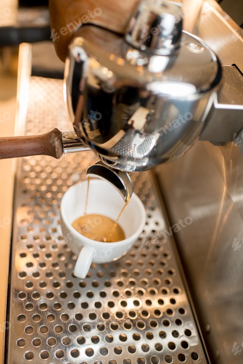 Preview: Making espresso with professional coffee machine