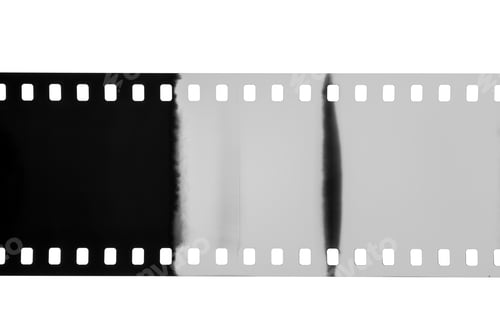 Preview: Black and white 35mm film strip with light leaks effect isolated on white.