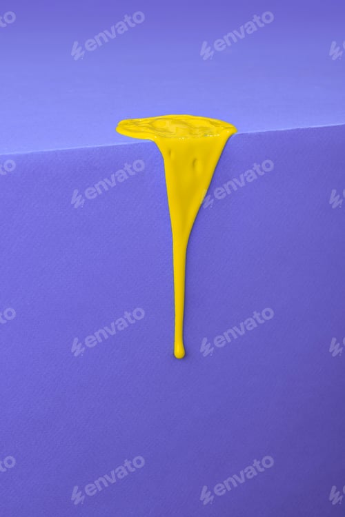 Preview: Bright yellow paint flows down a purple background.