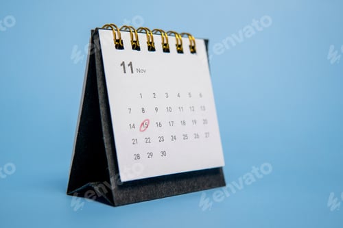 Preview: A close-up of a calendar with a red circle mark on it.