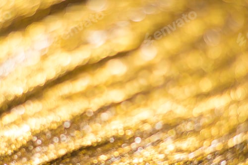 Preview: Gold bokeh. Abstract background. Defocused lights.