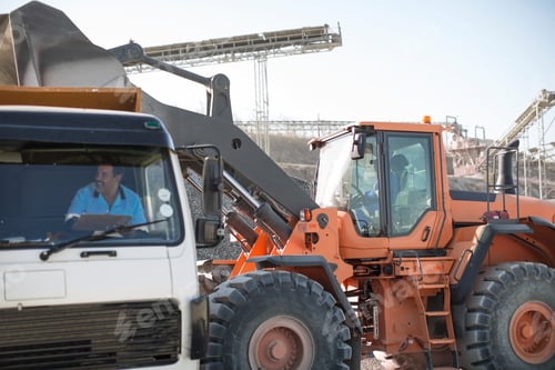 Preview: Wheel loader operator at a construction site.