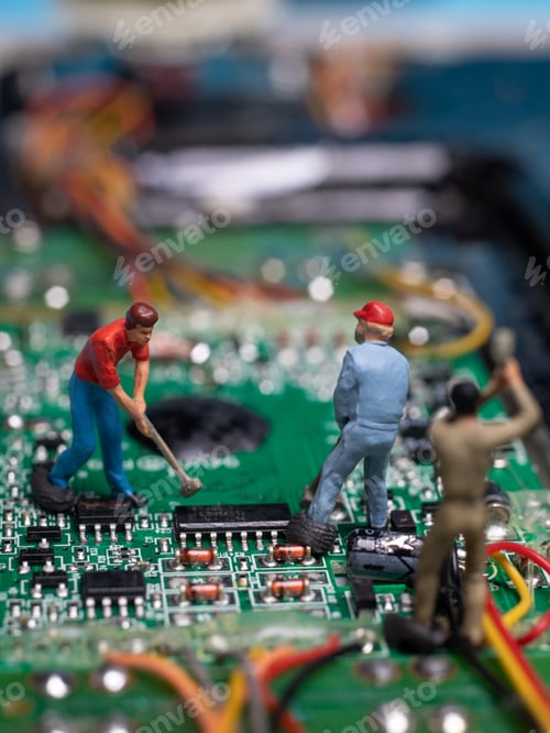 Preview: toy workers working on microchip