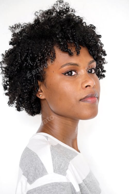 Preview: Black woman wearing striped top portrait looking away