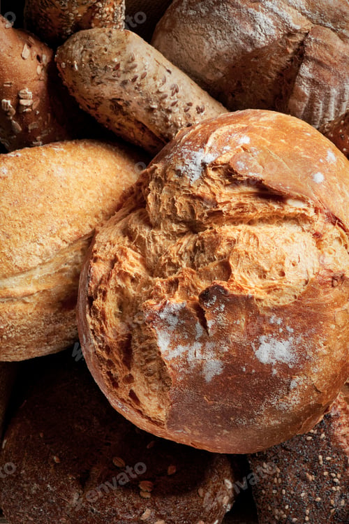 Preview: Different Types of Bread on dark background.