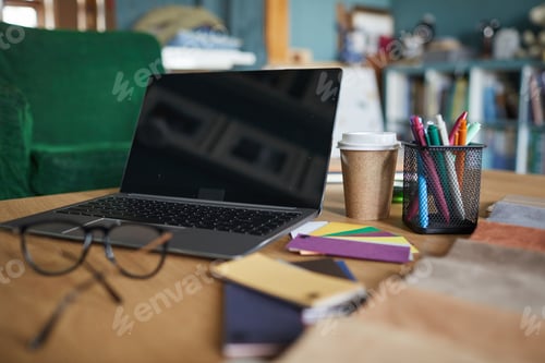 Preview: Workplace with laptop at office