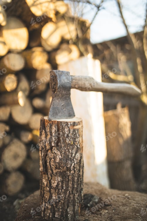 Preview: Ax for cutting firewood. Old vintage ax. Timber harvesting. Rural life. Wood.