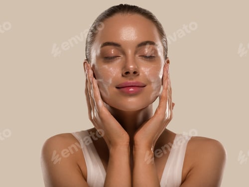Preview: Woman face mask wash soap close up clean skin. Color background brown