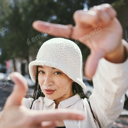 Preview: Portrait, hands frame and happy woman in city or urban town outdoor. Face, finger border and person